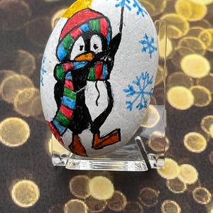 Penguin Wearing Snow Hat and Scarf Hanging on a Snowflake, Painted Rock, Winter Decor
