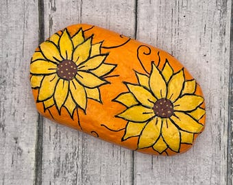 Girasoles amarillos y naranjas, rocas pintadas, arte con guijarros, pintura en piedra