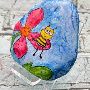 Whimsical Cartoon Bee on Flower Painted Rock, Hand Crafted Cartoon Bee Art Stone, Unique Gift for Bee Lover Garden