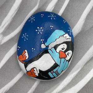 Penguin Laying Down Wearing Snow Hat, Hand Painted Rock, Winter Decor