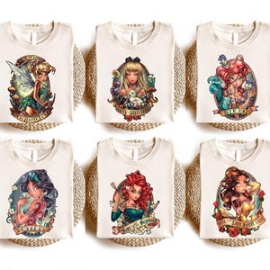 a group of t - shirts with different designs on them