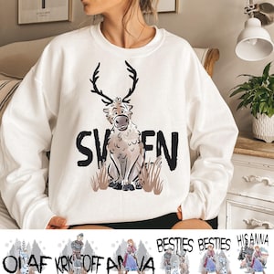 A woman wearing a white sweater with a graphic of a reindeer and the word "SVENS" printed on it.