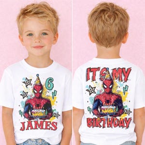 A young boy wearing a white t-shirt with a Spiderman design and the text "It's my birthday" printed on it.