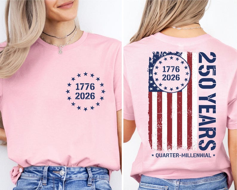 A woman wearing a pink t-shirt with a graphic design on the back. The design features the numbers 1776 and 2026, along with an American flag pattern, and the text "250 YEARS" and "QUARTER-MILLENNIAL".