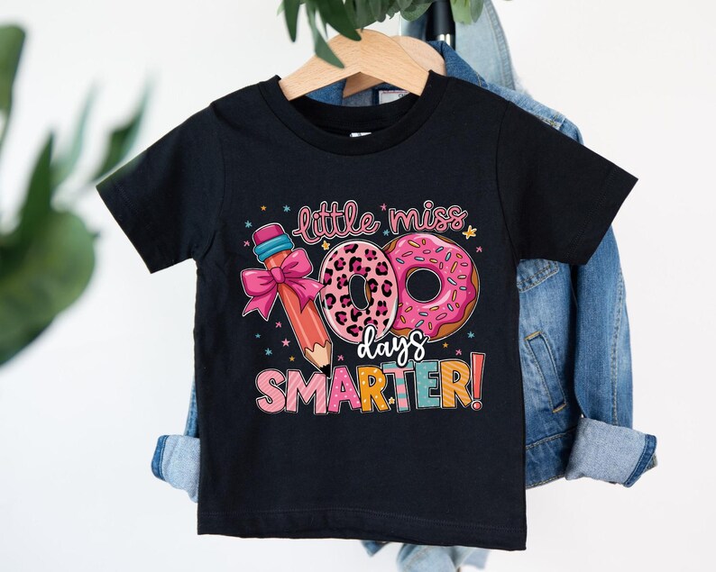 a black shirt that says little miss is smarter