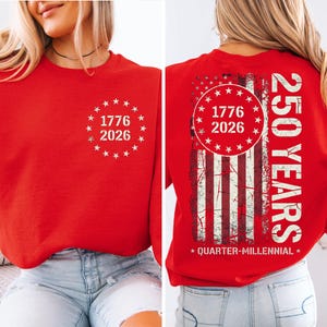 A red sweatshirt with white text and graphics on the back.