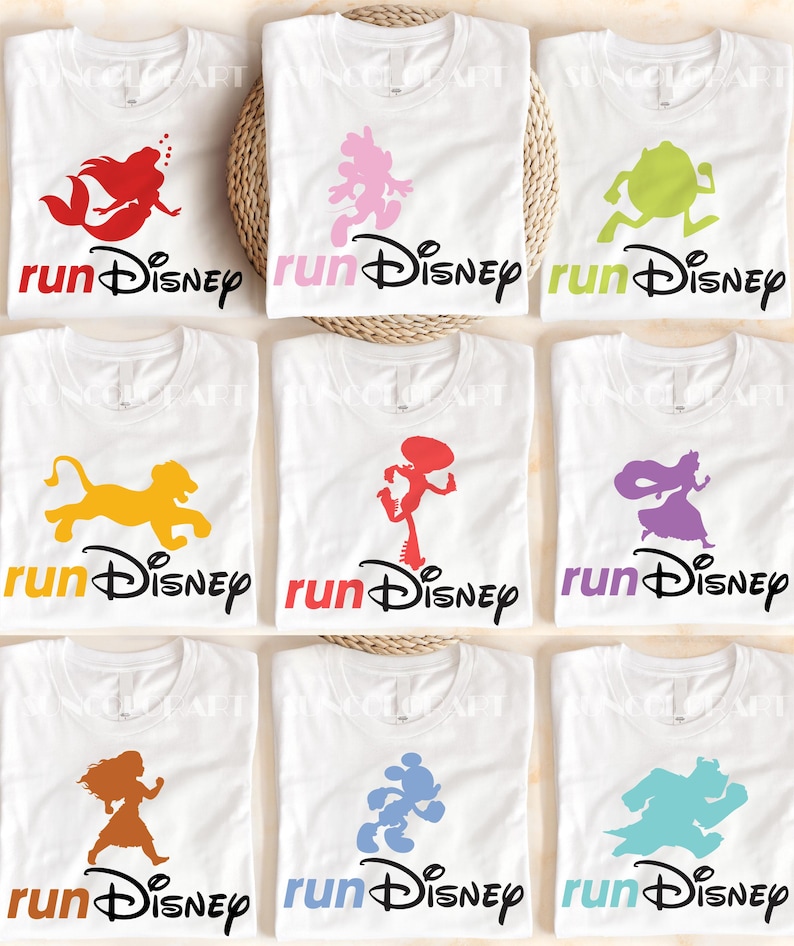 A collection of white t-shirts with various Disney-themed designs printed on them, including characters and logos.
