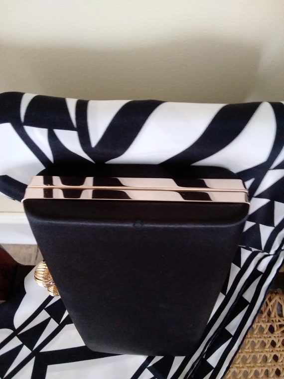 Beth jordan clutch sale