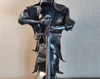 metal figurine with Tolkien character