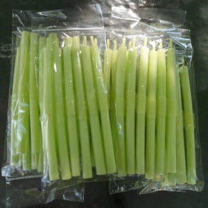 May include: A package of 30 green taper candles. The candles are packaged in clear plastic and are ready to be used.