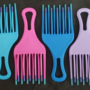 Haarprikker Kamlift dubbele rij styling afro diverse kleuren roze lichtblauw donkerblauw lichtpaars lila 1 stuk vintage NIEUW