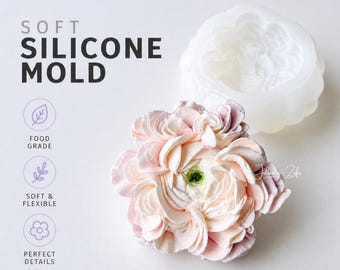 May include: A soft silicone mold with a detailed flower design. The mold is white and sits next to a realistic, light pink and green flower. The text "SOFT SILICONE MOLD" is displayed in black, along with icons indicating food grade, soft & flexible, and perfect details.