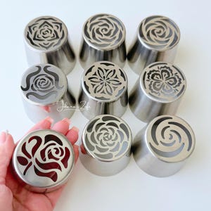 May include: A rustic wooden sign with the text "Welcome to our home" in white lettering. The sign features a distressed finish and a simple, inviting design, perfect for entryway decor.