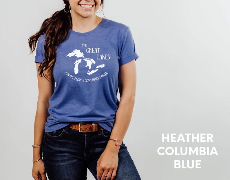 May include: A blue t-shirt with a white graphic of the Great Lakes and the text "The Great Lakes Always Fresh & Sometimes Frozen".