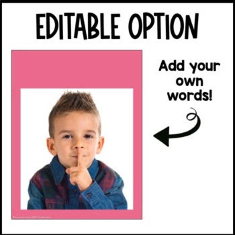 May include: A young boy with brown hair is holding his finger to his lips, making a shushing gesture. He is wearing a blue and red plaid shirt and a blue denim jacket. The background is a solid pink color.