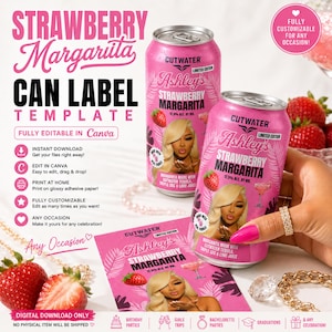 May include: Two pink aluminum beverage cans and a rectangular paper label featuring the text Ashley's Strawberry Margarita, a photograph of a person with blonde hair, strawberry illustrations, and the Cutwater brand logo on a pink background.