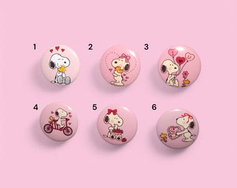 May include: Six pink round buttons with different images of Snoopy and Woodstock. The buttons are numbered 1 through 6.