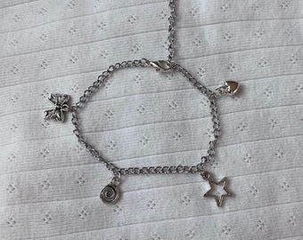 silver dangle charm bracelet (ribbon, swirl, star, heart charms)