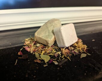 Ylang ylang and mango bath bomb with bath herbs