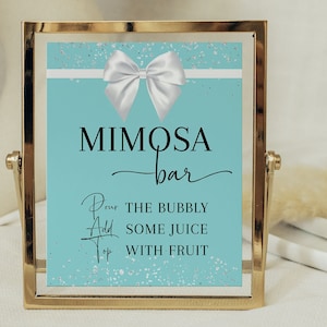 May include: A printable 8x10 inch table sign with a turquoise background and white glitter. The sign says "Mimosa Bar" with a white bow and instructions to "Pour the bubbly, add some juice, top with fruit".