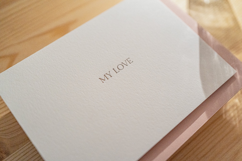 My love anniversary letterpress greeting card printed in matte gold ink with pink envelope