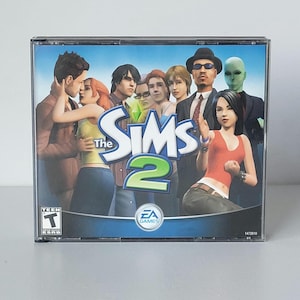 Juego para PC Los Sims 2, set de 4 discos CD-ROM, 2004, EA Games, Y2K, simulación vintage, set completo