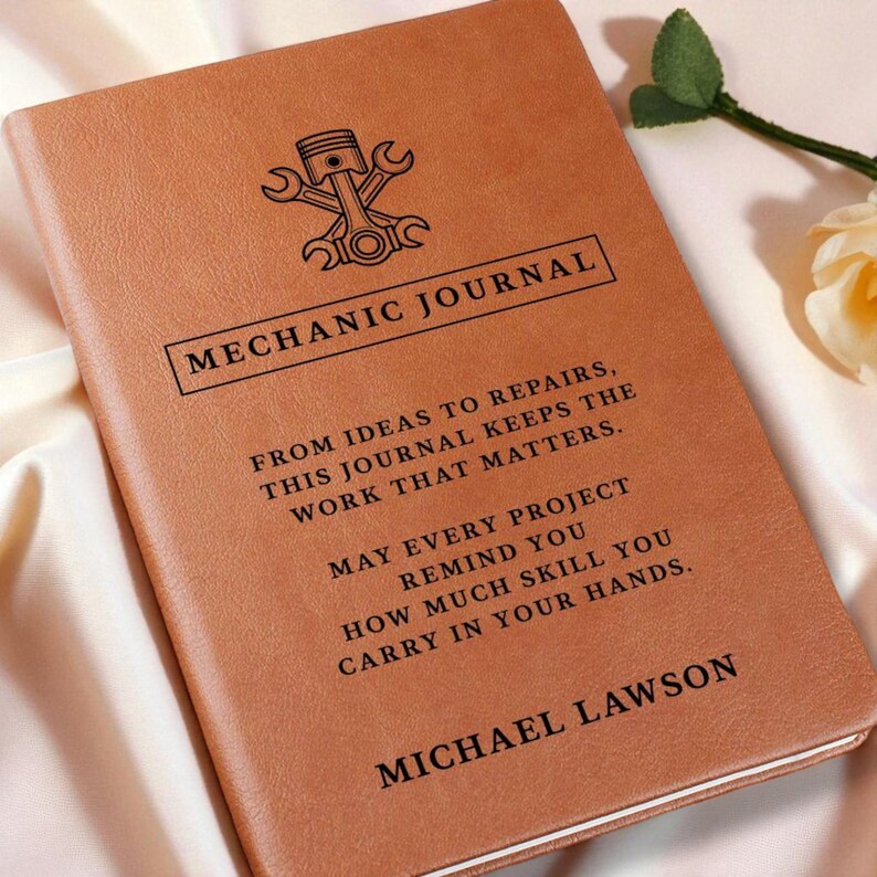 Brown leather mechanic journal, a personalized car guy gift with embossed emblem and MECHANIC JOURNAL title, custom text.