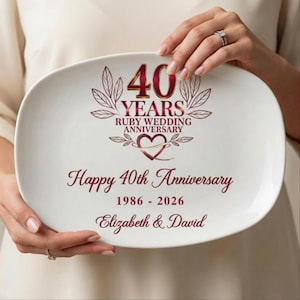 May include: A white ceramic mug with a black handle and the text "But First, Coffee" in a black, bold font. The mug is sitting on a wooden surface. The mug is 4 inches tall.