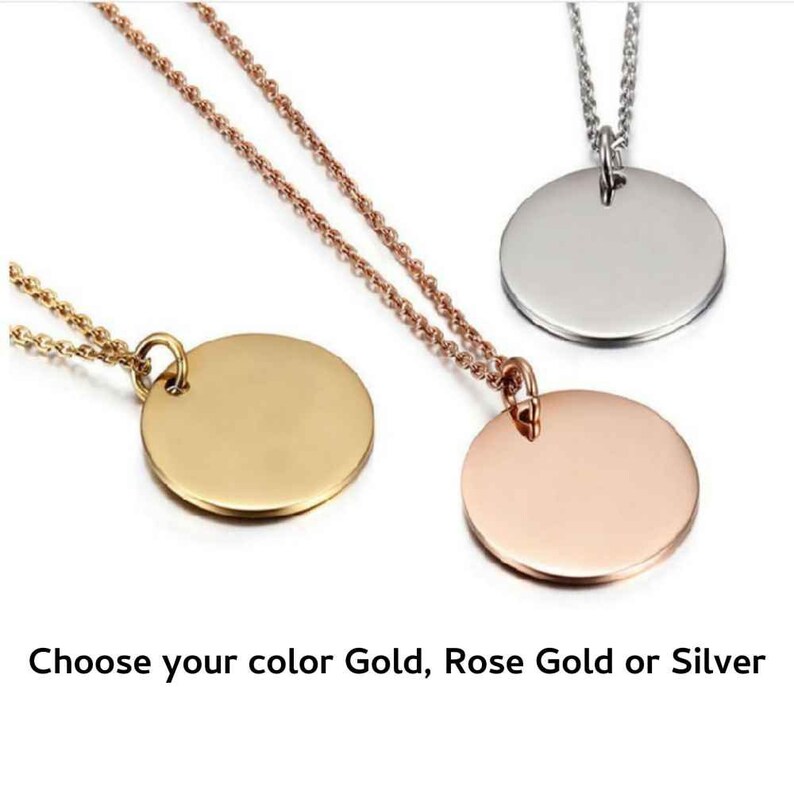 May include: Three necklaces with round pendant charms. The charms are blank and available in gold, rose gold, and silver.
