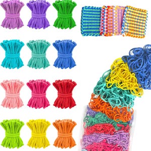 May include: A collection of colorful fabric loops in various shades including purple, green, blue, pink, red, yellow, and orange. The loops are bundled into small groups and also displayed as woven square mats and a large pile in a clear plastic bag.