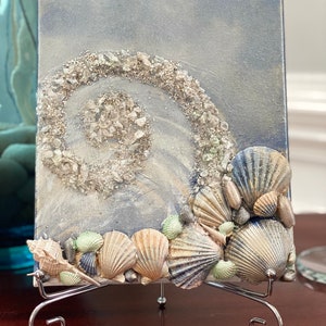 Add a little beach to your stand with this Canvas painting!