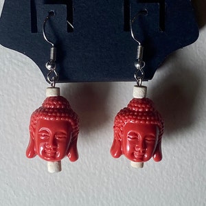 big buddha head earrings
