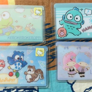 Portatarjetas Peppy de Keroppi Pata Pata con estrellas Little Twin de Hangyodon