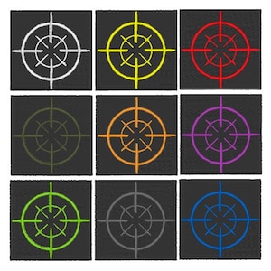 May include: Nine embroidered patches featuring a target design in various colors. The patches are square, with a black background and a target design in white, yellow, red, olive green, orange, purple, lime green, gray, and blue.