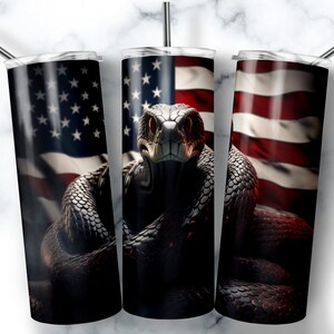 May include: Three stainless steel tumblers with a black snake wrapped around an American flag design. The snake has red eyes and is coiled around the flag.
