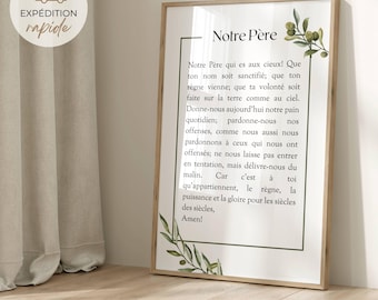 May include: A vertical rectangular wall art print featuring the French text of the Lord's Prayer, titled Notre Père, enclosed in a thin dark green border. The design includes watercolor olive branch illustrations in the top right and bottom left corners.