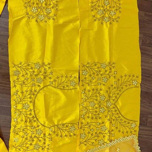 Yellow Colour Embroidered Attractive Party Wear Silk Lehenga choli has a Regular-fit and is Made From shops High-Grade Fabrics And Yarn
