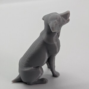 Grey  3D printed sitting labrador, white background, side view, facing to the right
