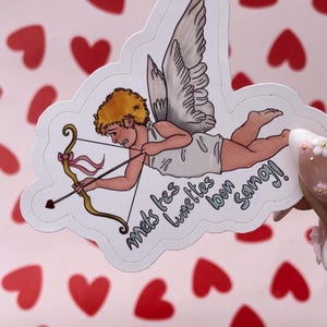 Sticker Cupidon fait mal son travail