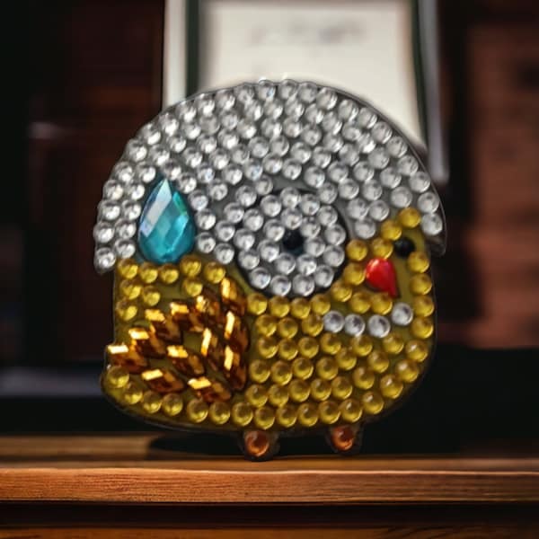 Fully gem encrusted magnet. Diamond, diamantè, and crystal encrusted fridge magnet, in shape of Easter chick with shell on head.