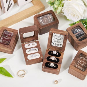 Personalized 3-ring ring box with clear lid in walnut; velvet lined, available in white, black, red, brown.

Personalized design colors are white and black.