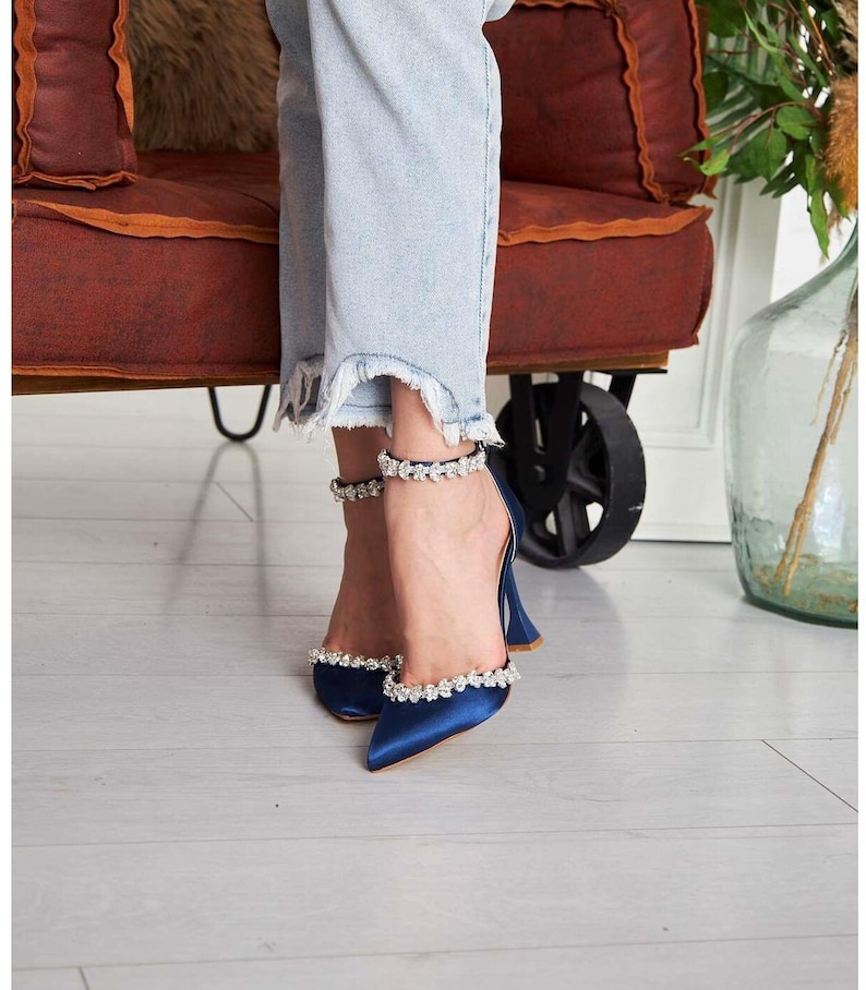navy blue pumps with ankle strap