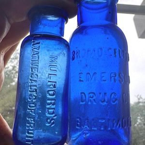 Two Antique Blue Embosed Bottle Bromo Seltzer & Milford’s Laxative Salts of Fruit