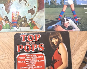 Schallplatten-Bundle. Musik aus den 1970er Jahren. Top die Pops. Werke von Hits. Heiße Hits.