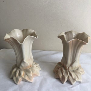 A pair of antique Robinson & Leadbeater Royal Ivory porcelain Vases
