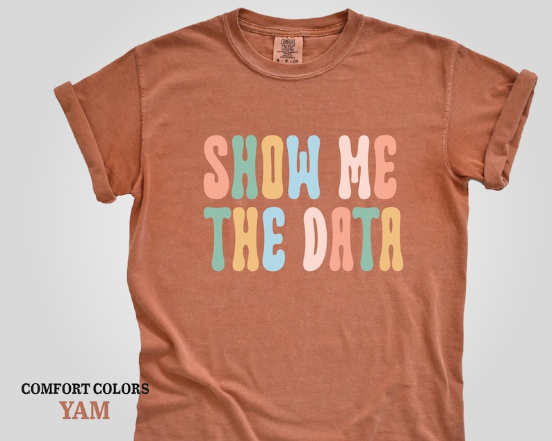 a t - shirt that says show me the data