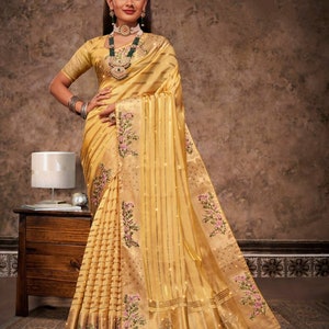Golden yellow Pure tissue reshom embroidered border swarovski work saree