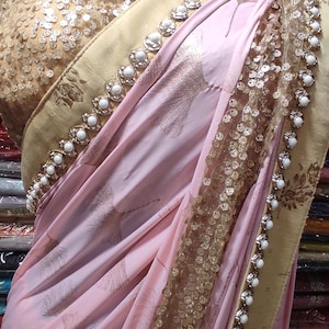 Styllish party wear pink saree with stiched blouse
