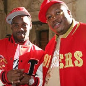 May include: Two people wearing red and white letterman jackets and red hats. The jackets have gold lettering and patches. One hat is a baseball cap, and the other is a beret. The jackets have black and white accents.
