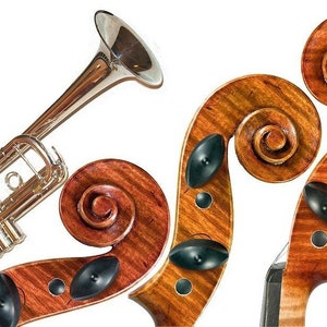 May include: A silver trumpet and two wooden violin bodies with black tuning pegs.